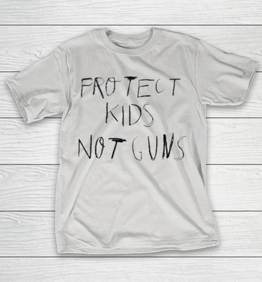 Giannis Antetokounmpo Wearing Protect Kids Not Guns Shirts